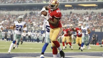 Sep 7, 2014; Arlington, TX, USA; San Francisco 49ers tight end Vernon Davis (85) catches a touchdown pass in the first quarter against the Dallas Cowboys at AT&T Stadium. Mandatory Credit: Matthew Emmons-USA TODAY Sports
