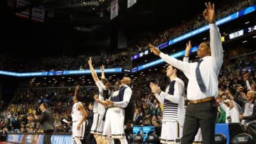 Mar 18, 2016; Brooklyn, NY, USA; Notre Dame Fighting Irish players celebrate on the bench against the Michigan Wolverines in the second half in the first round of the 2016 NCAA Tournament at Barclays Center. Mandatory Credit: Anthony Gruppuso-USA TODAY Sports