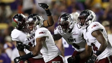 BATON ROUGE, LA - SEPTEMBER 30: Members of the Troy Trojans react after an interception against the LSU Tigers at Tiger Stadium on September 30, 2017 in Baton Rouge, Louisiana. (Photo by Chris Graythen/Getty Images)