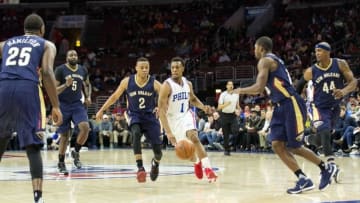 Apr 5, 2016; Philadelphia, PA, USA; Philadelphia 76ers guard Ish Smith (1) dribbles against New Orleans Pelicans guard Tim Frazier (2) and guard Toney Douglas (16) and center Kendrick Perkins (5) and guard Jordan Hamilton (25) and forward Dante Cunningham (44) during the second quarter at Wells Fargo Center. Mandatory Credit: Bill Streicher-USA TODAY Sports