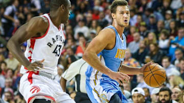 Oct 3, 2016; Calgary, Alberta, CAN; Denver Nuggets forward Danilo Gallinari (8) controls the ball under pressure from Toronto Raptors forward Pascal Siakam (43) during the third quarter at Scotiabank Saddledome. Mandatory Credit: Sergei Belski-USA TODAY Sports