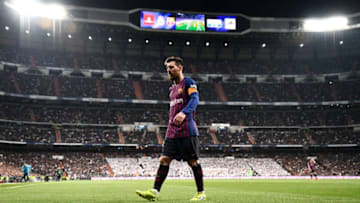 Barcelona's Argentinian forward Lionel Messi walks on the pitch during the Spanish league football match between Real Madrid CF and FC Barcelona at the Santiago Bernabeu stadium in Madrid on March 2, 2019. (Photo by OSCAR DEL POZO / AFP) (Photo credit should read OSCAR DEL POZO/AFP/Getty Images)