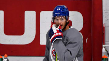 Jul 21, 2020; Montreal, Quebec, CANADA; Montreal Canadiens forward Jesperi Kotkaniemi (15) takes a breather during a NHL workout at Bell Sports Complex. Mandatory Credit: Eric Bolte-USA TODAY Sports