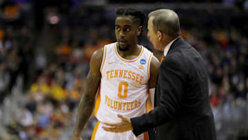 COLUMBUS, OHIO - MARCH 24: Head coach Rick Barnes of the Tennessee Volunteers speaks with Jordan Bone #0 after a play against the Iowa Hawkeyes during their game in the Second Round of the NCAA Basketball Tournament at Nationwide Arena on March 24, 2019 in Columbus, Ohio. (Photo by Elsa/Getty Images)
