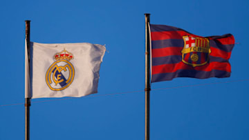 VALENCIA, SPAIN - JANUARY 30: Real Madrid and FC Barcelona flags are seen during the La Liga Santander match between Valencia CF and Elche CF at Estadio Mestalla on January 30, 2021 in Valencia, Spain. Sporting stadiums around Spain remain under strict restrictions due to the Coronavirus Pandemic as Government social distancing laws prohibit fans inside venues resulting in games being played behind closed doors. (Photo by Eric Alonso/Getty Images)