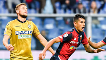 GENOA, ITALY - OCTOBER 28: Cristian Romero of Genoa (R) celebrates after scoring a goal during the Serie A match between Genoa CFC and Udinese at Stadio Luigi Ferraris on October 28, 2018 in Genoa, Italy. (Photo by Paolo Rattini/Getty Images)