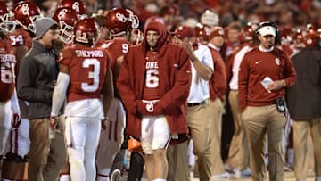 Nov 21, 2015; Norman, OK, USA; Oklahoma Sooners quarterback Baker Mayfield (6) walks on the sideline after being injured in action against the TCU Horned Frogs at Gaylord Family - Oklahoma Memorial Stadium. Mandatory Credit: Mark D. Smith-USA TODAY Sports