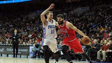 Jan 14, 2016; Philadelphia, PA, USA; Chicago Bulls forward Nikola Mirotic (44) drives to the net as Philadelphia 76ers guard Nik Stauskas (11) defends during the third quarter of the game at the Wells Fargo Center. The Chicago Bulls won the game 115-111 in overtime. Mandatory Credit: John Geliebter-USA TODAY Sports