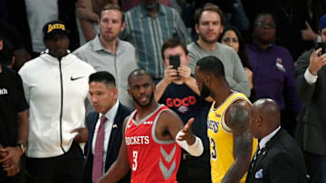 LOS ANGELES, CA - OCTOBER 20: Chris Paul #3 of the Houston Rockets speaks with LeBron James #23 of the Los Angeles Lakers after he was ejected for fighting during the second half of a basketball game at Staples Center on October 20, 2018 in Los Angeles, California. NOTE TO USER: User expressly acknowledges and agrees that, by downloading and or using this photograph, User is consenting to the terms and conditions of the Getty Images License Agreement. (Photo by Kevork Djansezian/Getty Images)