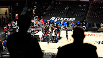 LOS ANGELES, CA - APRIL 18: Limited capacity fans attend a basketball game between Los Angeles Clippers and Minnesota Timberwolves at Staples Center on April 18, 2021 in Los Angeles, California. It has been over a year since fans have gathered at the Staples Center due to the coronavirus pandemic. NOTE TO USER: User expressly acknowledges and agrees that, by downloading and or using this photograph, User is consenting to the terms and conditions of the Getty Images License Agreement. (Photo by Kevork Djansezian/Getty Images)