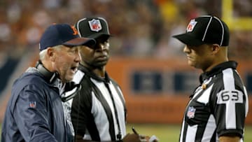 CHICAGO, IL - OCTOBER 09: Head coach John Fox of the Chicago Bears has words with back judge Jim Quirk