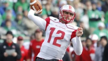 Nov 28, 2014; Huntington, WV, USA; Western Kentucky Hiltoppers quarterback Brandon Doughty (12) passes the ball against the Marshall Thundering Herd during the first half at Joan C. Edwards Stadium. Mandatory Credit: Mark Zerof-USA TODAY Sports