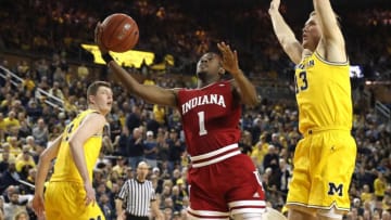 ANN ARBOR, MICHIGAN - JANUARY 06: Aljami Durham #1 of the Indiana Hoosiers gets a shot off next to Ignas Brazdeikis #13 of the Michigan Wolverines during the second half at Crisler Arena on January 06, 2019 in Ann Arbor, Michigan. Michigan won the game 74-63. (Photo by Gregory Shamus/Getty Images)