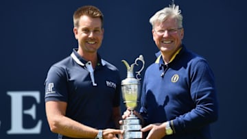 SOUTHPORT, ENGLAND - JULY 17: Champion Golfer of 2016 Henrik Stenson of Sweden returns the Claret Jug to R