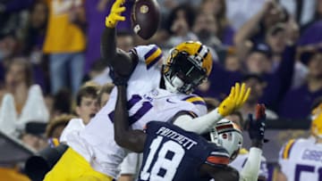 Auburn footballOct 2, 2021; Baton Rouge, Louisiana, USA; Auburn Tigers cornerback Nehemiah Pritchett (18) blocks a pass intended for LSU Tigers wide receiver Brian Thomas Jr. (11) during the first half at Tiger Stadium. Mandatory Credit: Stephen Lew-USA TODAY Sports