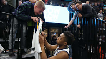SALT LAKE CITY, UT - FEBRUARY 24: Donovan Mitchell #45 of the Utah Jazz signs autographs after the game against the Dallas Mavericks on February 24, 2018 at Vivint Smart Home Arena in Salt Lake City, Utah. NOTE TO USER: User expressly acknowledges and agrees that, by downloading and or using this Photograph, User is consenting to the terms and conditions of the Getty Images License Agreement. Mandatory Copyright Notice: Copyright 2018 NBAE (Photo by Melissa Majchrzak/NBAE via Getty Images)