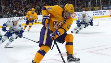 Mar 7, 2016; Los Angeles, CA, USA; Los Angeles Kings center Anze Kopitar (11) handles the puck in the third period of the game against the Vancouver Canucks at Staples Center. Kings won 5-1. Mandatory Credit: Jayne Kamin-Oncea-USA TODAY Sports