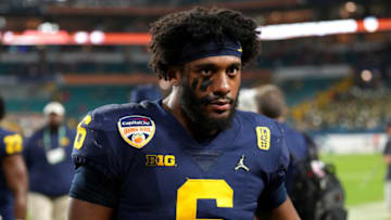 MIAMI GARDENS, FLORIDA - DECEMBER 31: R.J. Moten #6 of the Michigan Wolverines leaves the field after the Georgia Bulldogs defeated the Michigan Wolverines 34-11 in the Capital One Orange Bowl for the College Football Playoff semifinal game at Hard Rock Stadium on December 31, 2021 in Miami Gardens, Florida. (Photo by Mark Brown/Getty Images)