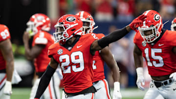 ATLANTA, GA - SEPTEMBER 3: Christopher Smith #29 of the Georgia Bulldogs celebrates an interception during a game between Oregon Ducks and Georgia Bulldogs at Mercedes-Benz Stadium on September 3, 2022 in Atlanta, Georgia. (Photo by Steve Limentani/ISI Photos/Getty Images)