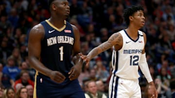NEW ORLEANS, LOUISIANA - JANUARY 31: Zion Williamson #1 of the New Orleans Pelicans and Ja Morant #12 of the Memphis Grizzlies stand on the court during a NBA game at Smoothie King Center on January 31, 2020 in New Orleans, Louisiana. NOTE TO USER: User expressly acknowledges and agrees that, by downloading and or using this photograph, User is consenting to the terms and conditions of the Getty Images License Agreement. (Photo by Sean Gardner/Getty Images)