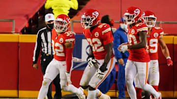 Oct 5, 2020; Kansas City, Missouri, USA; Kansas City Chiefs strong safety Tyrann Mathieu (32) celebrates after returning an interception for a touchdown against the New England Patriots during the fourth quarter of a NFL game at Arrowhead Stadium. Mandatory Credit: Jay Biggerstaff-USA TODAY Sports