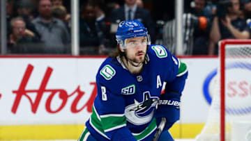 VANCOUVER, BC - DECEMBER 1: Christopher Tanev #8 of the Vancouver Canucks skates up ice during their NHL game against the Edmonton Oilers at Rogers Arena December 1, 2019 in Vancouver, British Columbia, Canada. (Photo by Jeff Vinnick/NHLI via Getty Images)"n