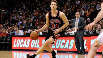 Feb 4, 2014; Phoenix, AZ, USA; Chicago Bulls forward Mike Dunleavy (34) handles the ball against the Phoenix Suns in the first half at US Airways Center. The Bulls won 101-92. Mandatory Credit: Jennifer Stewart-USA TODAY Sports