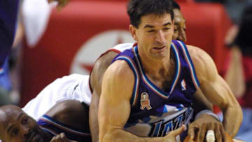 John Stockton, Bryon Russell, Utah Jazz. Scottie Pippen, Portland Trail-Blazers. (Photo credit should read JOHN GRESS/AFP via Getty Images)