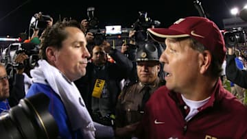 TALLAHASSEE, FL - NOVEMBER 24: Florida Gators head coach Will Muschamp shakes hands with Florida State Seminoles head coach Jimbo Fisher following a game at Doak Campbell Stadium on November 24, 2012 in Tallahassee, Florida. (Photo by Mike Ehrmann/Getty Images)