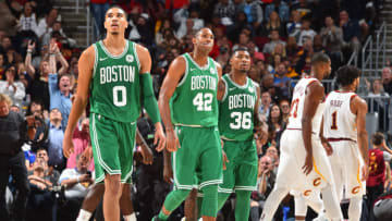 CLEVELAND, OH - OCTOBER 17: Jayson Tatum #0, Al Horford #42 and Marcus Smart #36 of the Boston Celtics walk off the cour against the Cleveland Cavaliers on October 17, 2017 at Quicken Loans Arena in Cleveland, Ohio. NOTE TO USER: User expressly acknowledges and agrees that, by downloading and/or using this Photograph, user is consenting to the terms and conditions of the Getty Images License Agreement. Mandatory Copyright Notice: Copyright 2017 NBAE (Photo by Jesse D. Garrabrant/NBAE via Getty Images)