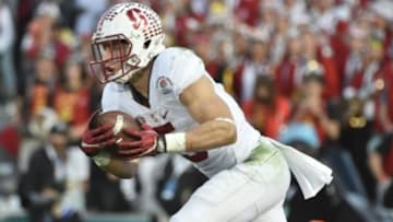 Jan 1, 2016; Pasadena, CA, USA; Stanford Cardinal running back Christian McCaffrey (5) runs against the Iowa Hawkeyes during the third quarter in the 2016 Rose Bowl at Rose Bowl. Mandatory Credit: Robert Hanashiro-USA TODAY Sports
