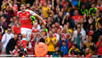 Arsenal's Spanish defender Hector Bellerin celerbates scoring their opening goal during the English Premier League football match between Arsenal and Everton at the Emirates Stadium in London on May 21, 2017. / AFP PHOTO / Justin TALLIS / RESTRICTED TO EDITORIAL USE. No use with unauthorized audio, video, data, fixture lists, club/league logos or 'live' services. Online in-match use limited to 75 images, no video emulation. No use in betting, games or single club/league/player publications. / (Photo credit should read JUSTIN TALLIS/AFP/Getty Images)