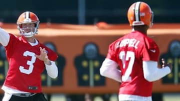 Jun 4, 2013; Berea, OH, USA; Cleveland Browns quarterback Brandon Weeden (3) throws to quarterback Jason Campbell (17) during minicamp at the Cleveland Browns Training Facility. Mandatory Credit: Ron Schwane-USA TODAY Sports