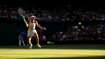 LONDON, ENGLAND - JULY 04: Caroline Wozniacki of Denmark plays a forehand during the Ladies Singles first round match against Timea Babos of Hungary on day two of the Wimbledon Lawn Tennis Championships at the All England Lawn Tennis and Croquet Club on July 4, 2017 in London, England. (Photo by Michael Steele/Getty Images)