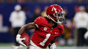 ATLANTA, GEORGIA - DECEMBER 04: Jameson Williams #1 of the Alabama Crimson Tide rushes against the Georgia Bulldogs during the third quarter of the SEC Championship game against the at Mercedes-Benz Stadium on December 04, 2021 in Atlanta, Georgia. (Photo by Todd Kirkland/Getty Images)