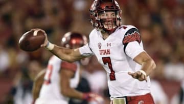 Oct 24, 2015; Los Angeles, CA, USA; Utah Utes quarterback Travis Wilson (7) attempts a pass during the third quarter against the Southern California Trojans at Los Angeles Memorial Coliseum. The Southern California Trojans won 42-24. Mandatory Credit: Kelvin Kuo-USA TODAY Sports