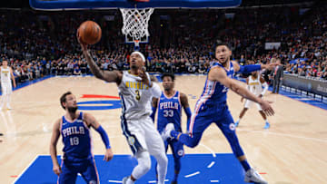 PHILADELPHIA,PA - MARCH 26 : Torrey Craig #3 of the Denver Nuggets goes up for the layup against the Philadelphia 76ers at Wells Fargo Center on March 26, 2018 in Philadelphia, Pennsylvania NOTE TO USER: User expressly acknowledges and agrees that, by downloading and/or using this Photograph, user is consenting to the terms and conditions of the Getty Images License Agreement. Mandatory Copyright Notice: Copyright 2018 NBAE (Photo by Jesse D. Garrabrant/NBAE via Getty Images)