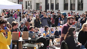 People gather for a watch party for the NCAA March Madness tournament