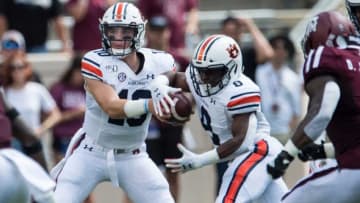 Auburn football quarterback Bo Nix (10) fakes a handoff to Auburn running back Shaun Shivers (8) at Kyle Field in College Station, Texas, on Saturday, Sept. 21, 2019. Auburn leads Texas A&M 14-3 at halftime.Jc Auburntamu 37