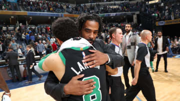 MEMPHIS, OH - DECEMBER 16: Mike Conley #11 of the Memphis Grizzlies hugs Shane Larkin #8 of the Boston Celtics after the game on December 16, 2017 at FedEx Forum in Memphis, Ohio. NOTE TO USER: User expressly acknowledges and agrees that, by downloading and/or using this photograph, user is consenting to the terms and conditions of the Getty Images License Agreement. Mandatory Copyright Notice: Copyright 2017 NBAE (Photo by Joe Murphy/NBAE via Getty Images)