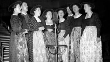 The von Trapp family performs on a London radio show in December 1937.