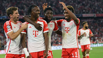 Bayern Munich players celebrating Mathys Tel's goal against Manchester United. (Photo by CHRISTOF STACHE/AFP via Getty Images)