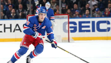 NEW YORK, NY - MARCH 25: Brady Skjei #76 of the New York Rangers skates with the puck against the Pittsburgh Penguins at Madison Square Garden on March 25, 2019 in New York City. The Pittsburgh Penguins won 5-2. (Photo by Jared Silber/NHLI via Getty Images)