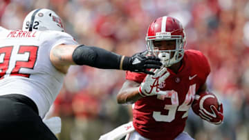 TUSCALOOSA, AL - SEPTEMBER 08: Damien Harris #34 of the Alabama Crimson Tide rushes against Forrest Merrill #92 of the Arkansas State Red Wolves at Bryant-Denny Stadium on September 8, 2018 in Tuscaloosa, Alabama. (Photo by Kevin C. Cox/Getty Images)
