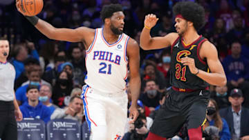 Feb 12, 2022; Philadelphia, Pennsylvania, USA; Philadelphia 76ers center Joel Embiid (21) controls the ball against Cleveland Cavaliers center Jarrett Allen (31) in the first half at the Wells Fargo Center. Mandatory Credit: Mitchell Leff-USA TODAY Sports
