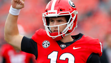 ATHENS, GA - NOVEMBER 06: Stetson Bennett #13 of the Georgia Bulldogs warms up prior to the game against the Missouri Tigers at Sanford Stadium on November 6, 2021 in Athens, Georgia. (Photo by Todd Kirkland/Getty Images)
