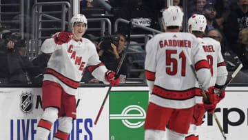 LOS ANGELES, CALIFORNIA - OCTOBER 15: Martin Necas #88 of the Carolina Hurricanes reacts to his goal in front of ch18#21 and Jake Gardiner #51, to take a 1-0 lead over the Los Angeles Kings, during the second period at Staples Center on October 15, 2019 in Los Angeles, California. (Photo by Harry How/Getty Images)