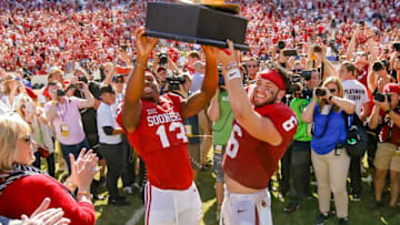 Auburn footballOklahoma's Ahmad Thomas (13) and Baker Mayfield (6) hold up the Golden Hat trophy after the Red River Showdown college football game between the University of Oklahoma Sooners (OU) and the Texas Longhorns (UT) at Cotton Bowl Stadium in Dallas, Saturday, Oct. 8, 2016. Oklahoma won 45-40.