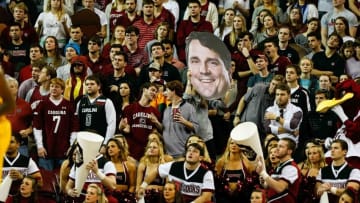 Jan 16, 2016; Columbia, SC, USA; South Carolina Gamecocks student section sporting a new fathead of new football coach Will Muschamp during the regular season game at Colonial Life Arena. Gamecocks win 81-72 over the Tigers. Mandatory Credit: Jim Dedmon-USA TODAY Sports
