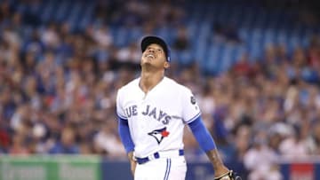 TORONTO, ON - AUGUST 7: Marcus Stroman #6 of the Toronto Blue Jays watches a pop up during MLB game action against the Boston Red Sox at Rogers Centre on August 7, 2018 in Toronto, Canada. (Photo by Tom Szczerbowski/Getty Images)